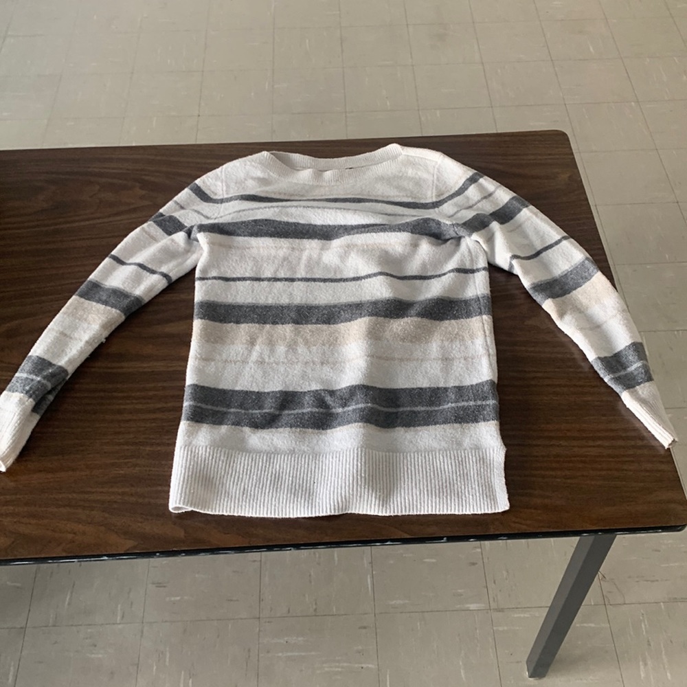 Off the shoulder grey and white sweater